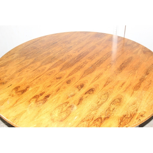 84 - A retro rosewood effect circular dining table with chrome legs, likely Danish but unmarked, approx 1... 