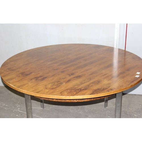 84 - A retro rosewood effect circular dining table with chrome legs, likely Danish but unmarked, approx 1... 