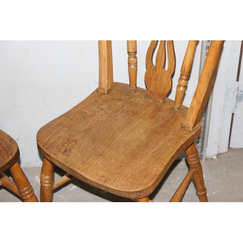 86 - A pair of vintage elm seated country kitchen chairs