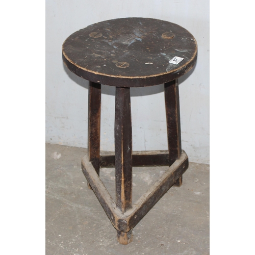 87 - A rustic painted pine 3 legged stool