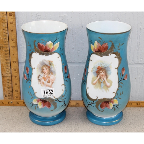 1652 - A large pair of Victorian milk glass vases decorated with a girl and cat, approx 30cm tall