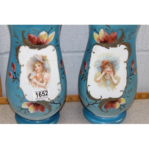 1652 - A large pair of Victorian milk glass vases decorated with a girl and cat, approx 30cm tall