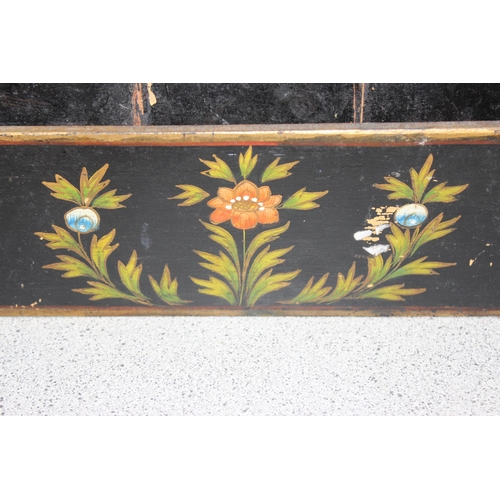 289 - An early 20th century wooden letter rack with floral painted details