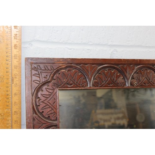 403 - Antique carved oak framed mirror