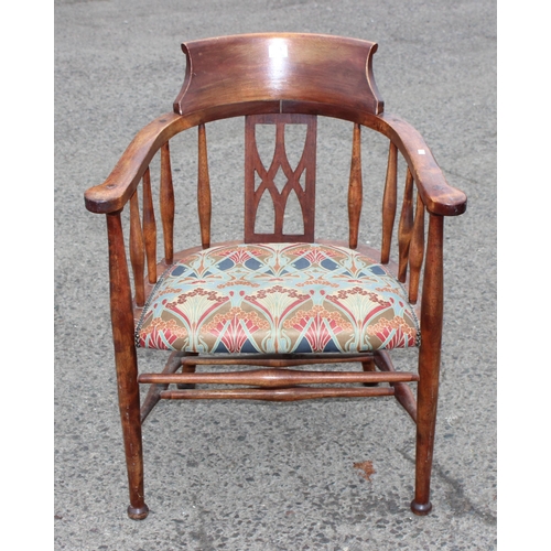 99 - An early 20th century horseshoe type armchair or bow chair