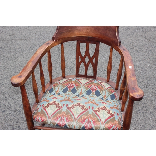 99 - An early 20th century horseshoe type armchair or bow chair