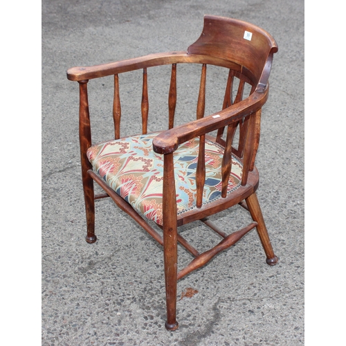 99 - An early 20th century horseshoe type armchair or bow chair