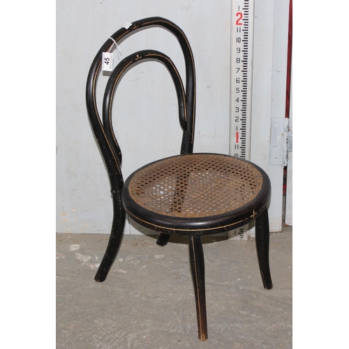 45A - A Georgian mahogany elbow chair with geometric ebony type inlay and an antique ebonised bentwood chi... 