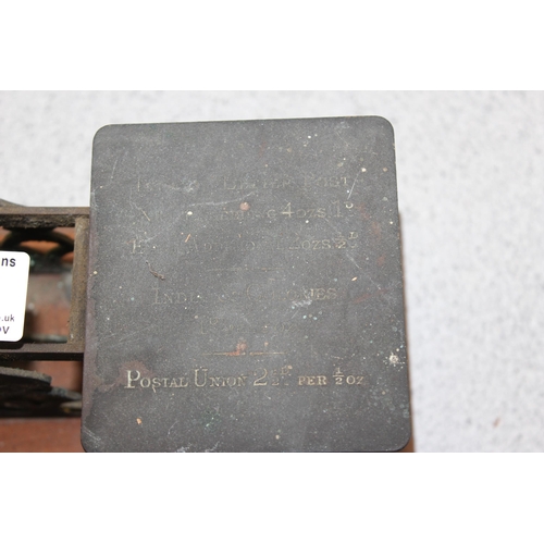 657 - An antique set of Sampson Mordan letter scales and weights and a set of chrome bell weights