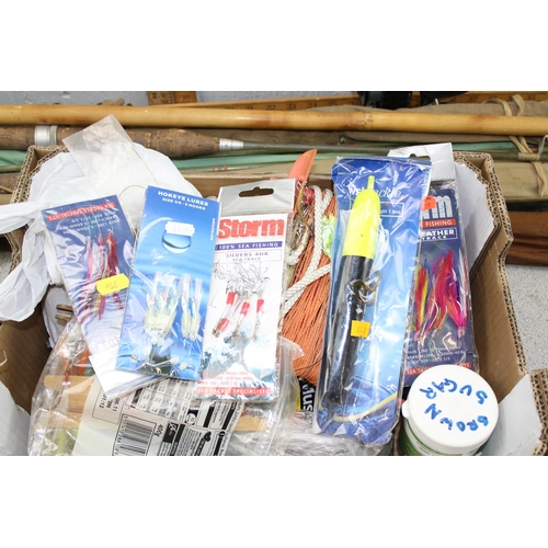 736 - A large qty of assorted fishing related items, rods reels etc etc