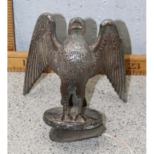 738 - An early 20th century chrome plated car mascot formed as a hawk or falcon