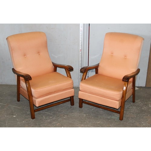 135 - A pair of vintage Parker Knoll style armchairs