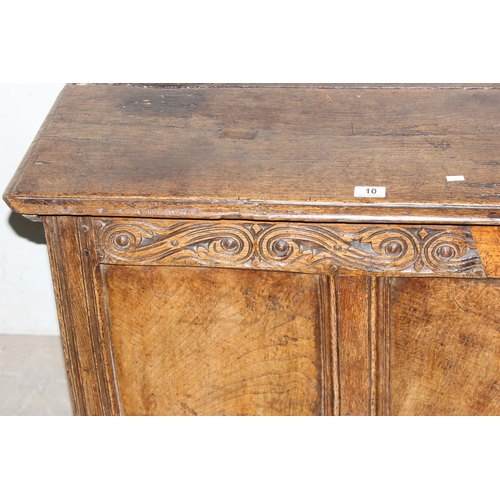 140 - Antique oak coffer with carved details and candle box to interior, 18th century or earlier, approx 1... 