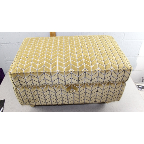 145 - Karki coloured fabric Ottoman on brass castors