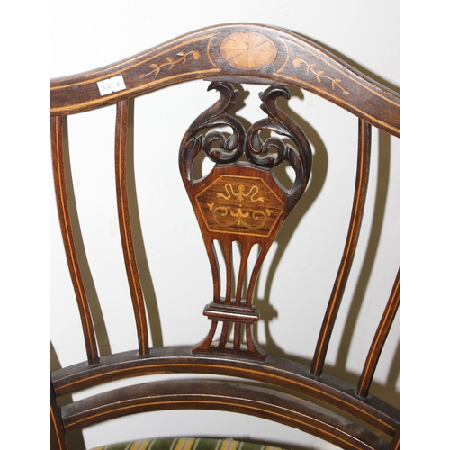 148 - Pair of Edwardian Sheraton revival inlaid round seated low arm chairs with striped upholstery