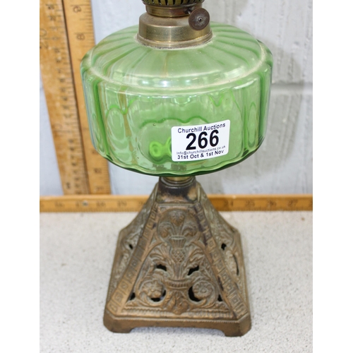 266 - Antique cast brass oil lamp with green glass reservoir