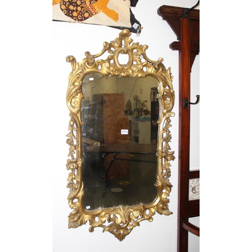 499f - An antique carved giltwood pier mirror, in Louis XV style, likely French 19th century, the frame wit... 