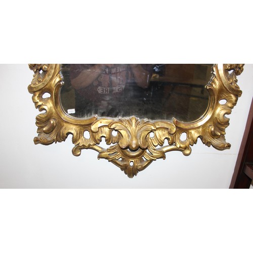 499f - An antique carved giltwood pier mirror, in Louis XV style, likely French 19th century, the frame wit... 