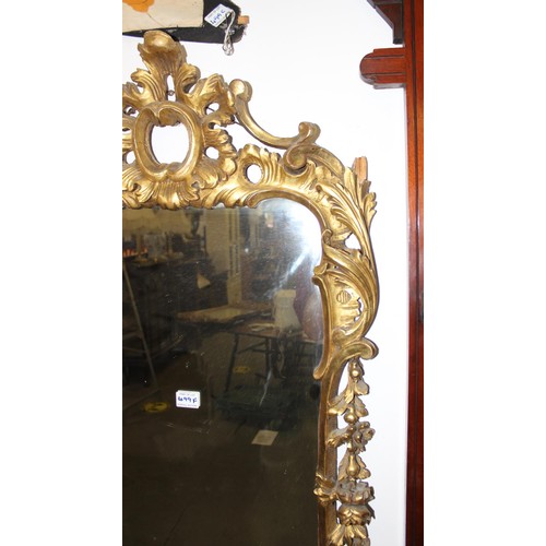 499f - An antique carved giltwood pier mirror, in Louis XV style, likely French 19th century, the frame wit... 