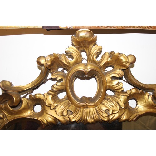 499g - An antique carved giltwood pier mirror, in Louis XV style, likely French 19th century, the frame wit... 