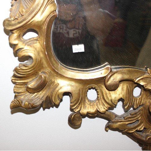 499g - An antique carved giltwood pier mirror, in Louis XV style, likely French 19th century, the frame wit... 