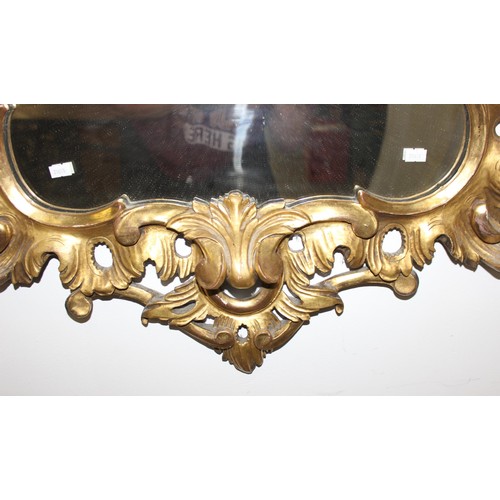 499g - An antique carved giltwood pier mirror, in Louis XV style, likely French 19th century, the frame wit... 