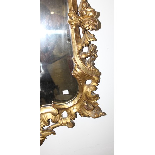 499g - An antique carved giltwood pier mirror, in Louis XV style, likely French 19th century, the frame wit... 