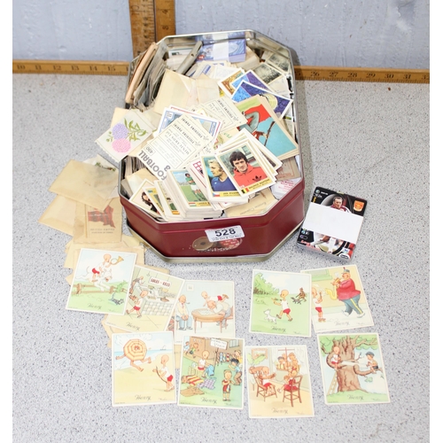 528 - Mixed tin of ephemera to include silk cigarette card & Panini football stickers