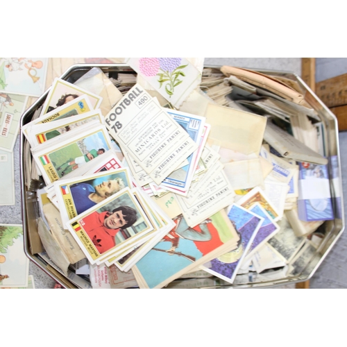 528 - Mixed tin of ephemera to include silk cigarette card & Panini football stickers