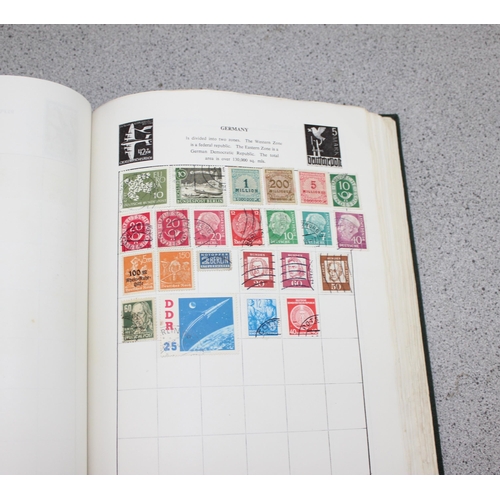 532 - 2 stamp stock books containing mainly foreign stamps & a Liberty stamp album with contents