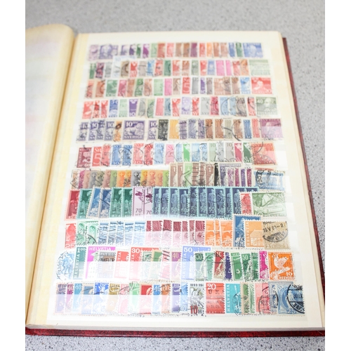 532 - 2 stamp stock books containing mainly foreign stamps & a Liberty stamp album with contents