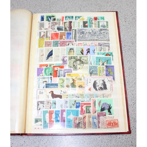 532 - 2 stamp stock books containing mainly foreign stamps & a Liberty stamp album with contents