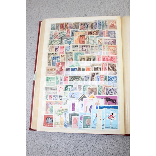 532 - 2 stamp stock books containing mainly foreign stamps & a Liberty stamp album with contents