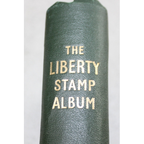 532 - 2 stamp stock books containing mainly foreign stamps & a Liberty stamp album with contents