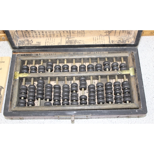 667 - Boxed Chinese abacus