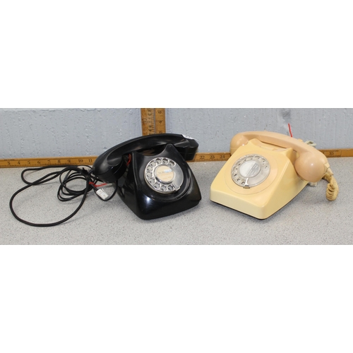 668 - 2 Vintage telephones, 1 black & 1 cream.