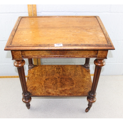 127 - A Victorian walnut two tier stand or side table with integrated drawer on turned column supports wit... 