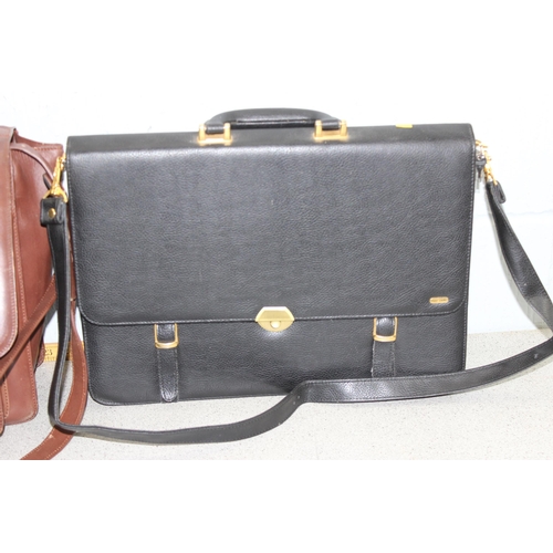 205 - 2 leather effect brief/document cases, one Pierre Cardin, both with shoulder straps.