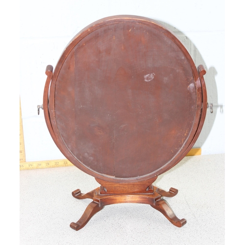 302 - A 19th century mahogany framed adjustable oval toilet mirror on splayed feet with applied ivorine ro... 