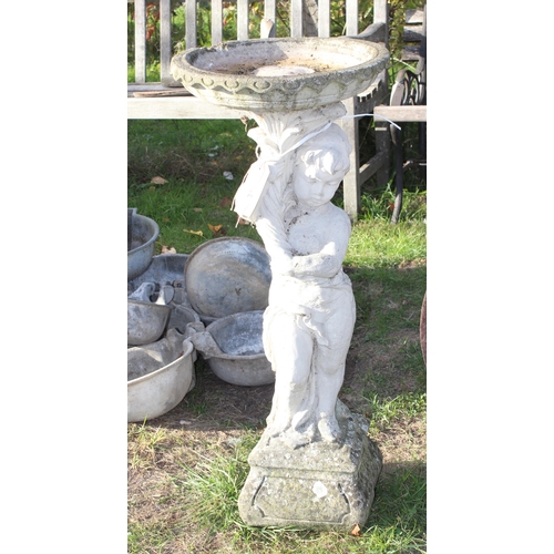 343 - Concrete birdbath formed as a Cherub