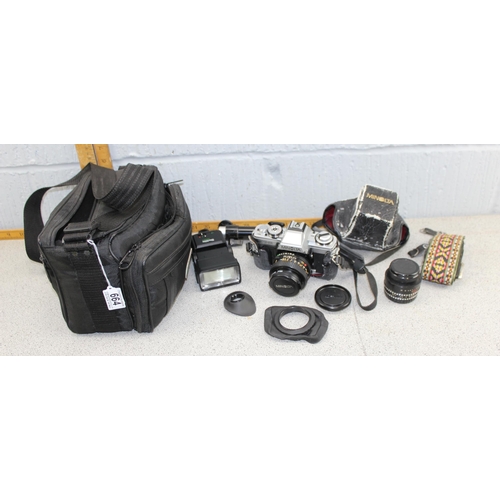 664 - Minolta XG-M camera with 2 lenses and case