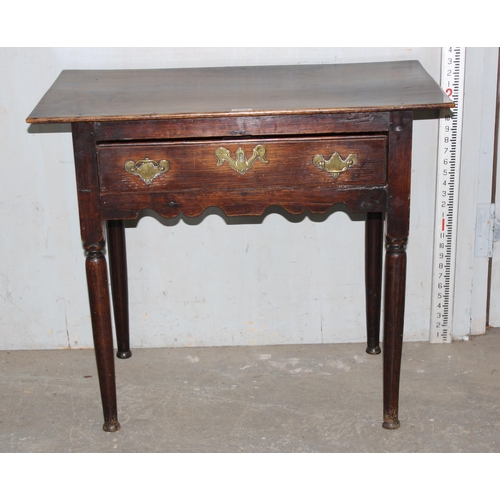 125 - A Georgian oak lowboy with single drawer and brass fittings