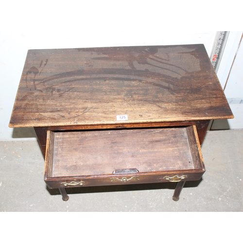 125 - A Georgian oak lowboy with single drawer and brass fittings