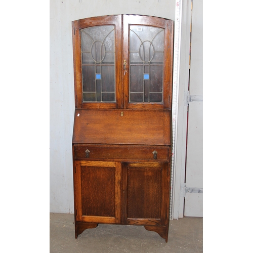 109 - Edwardian oak bureau bookcase with stained glass detail and key