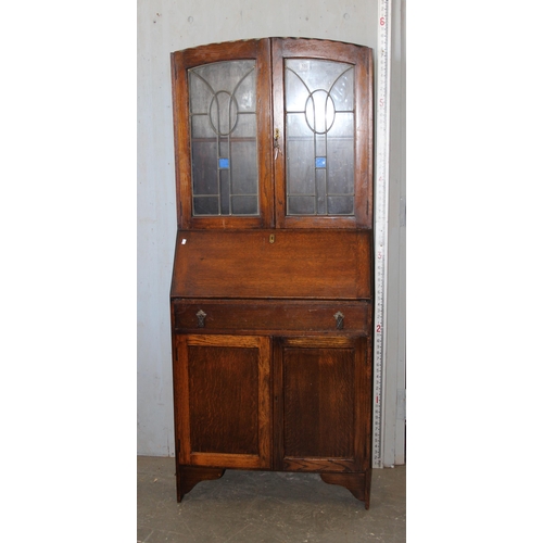 109 - Edwardian oak bureau bookcase with stained glass detail and key