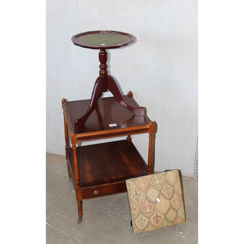 116 - Mahogany wine table, tapestry foot stool and a yew wood trolley on brass castors