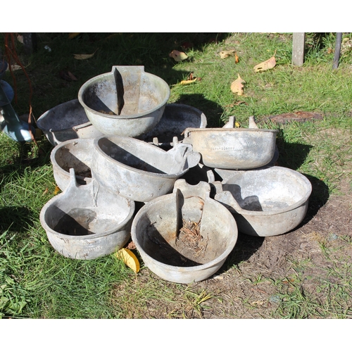 329 - 11 vintage aluminium cattle feeding bowls