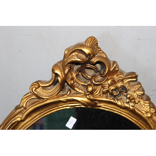 415 - Gilt on plaster oval wall mirror