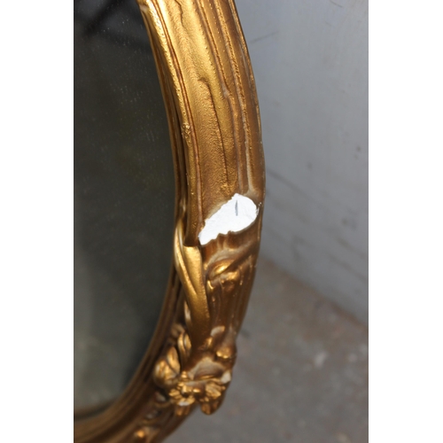 415 - Gilt on plaster oval wall mirror