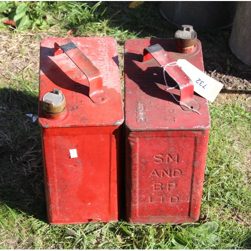 732 - 2 vintage fuel cans with brass caps, one marked SM and BP LTD, with some contents